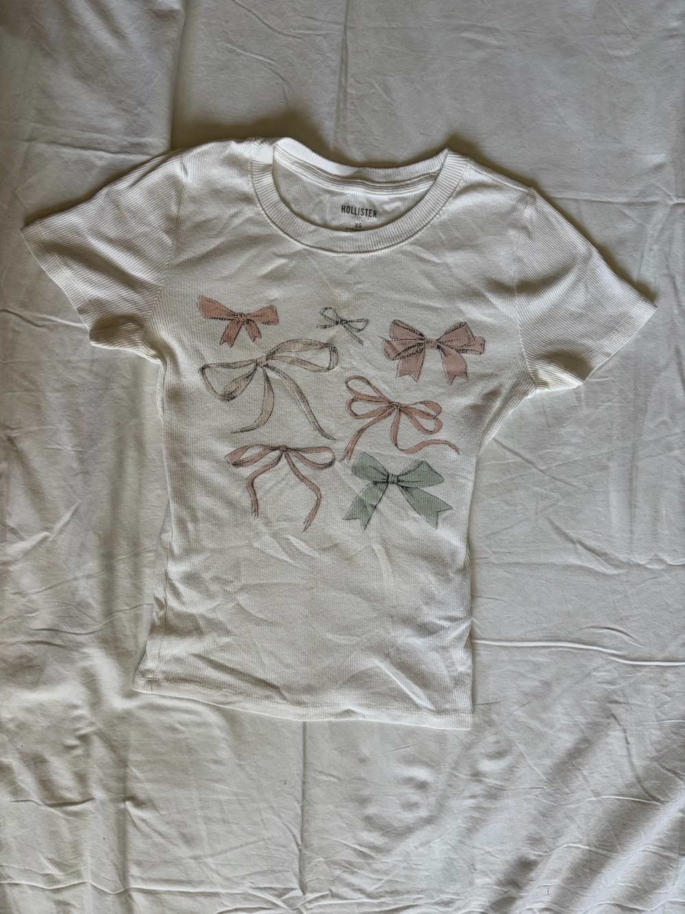 Hollister White Short-Sleeve Tee with Pastel Bow Motif